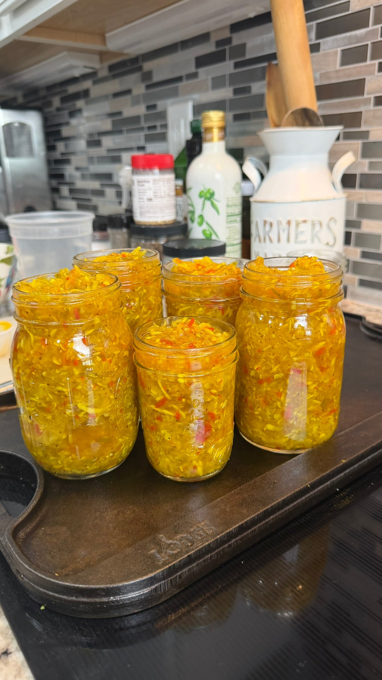 homemade Squash Relish in mason jars with lids